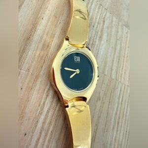 Esq Swiss by Movado ladies black dial gold tone dress watch NEW BATTERY